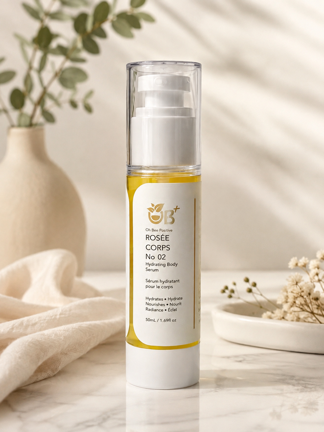 OB+ Rosée Corps No 02 hydrating body serum, 50 mL pump bottle with golden serum